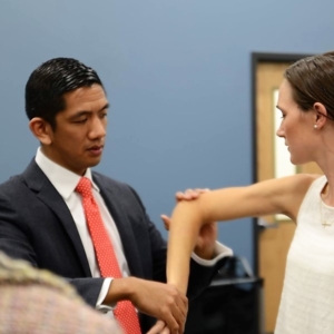 Dr. Caballes conducting a demonstration at Cornerstone Orthopaedic’s Annual Symposium.